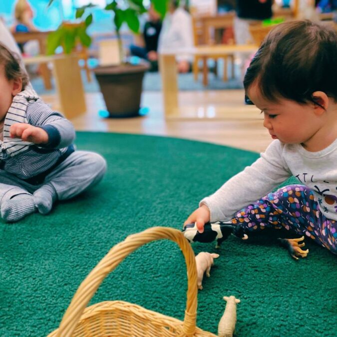 toddlers playing at Montessori school