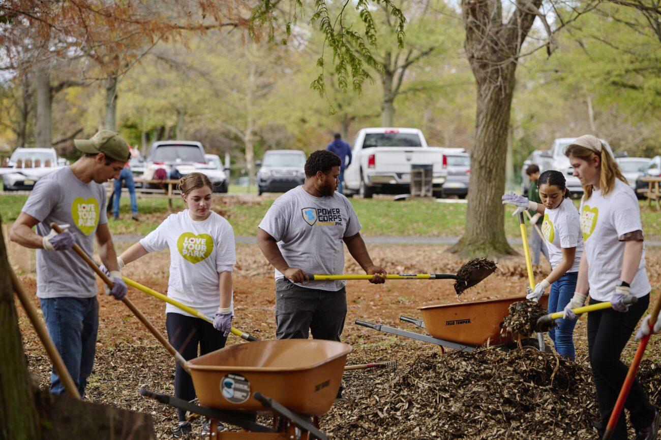 Group of volunteers doing clean up work in a Philadelphia park