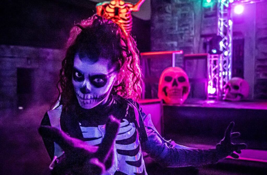 A female skeleton ghoul beckons from Halloween Nights at Eastern State Penitentiary in Philadelphia. 