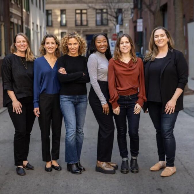 The partners at Whole Heart Maternal Mental Health posing in the streets of Philadelphia for a group shot