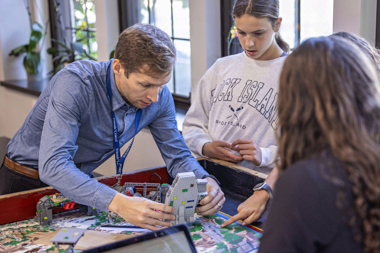 Friends Central school robotics teacher working with students