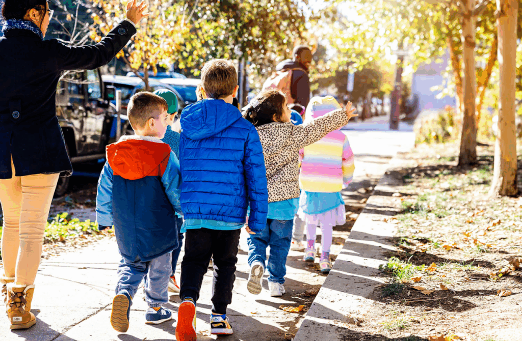 Preschool children at Aspen Grove walking on the sidewalk in Philadelphia