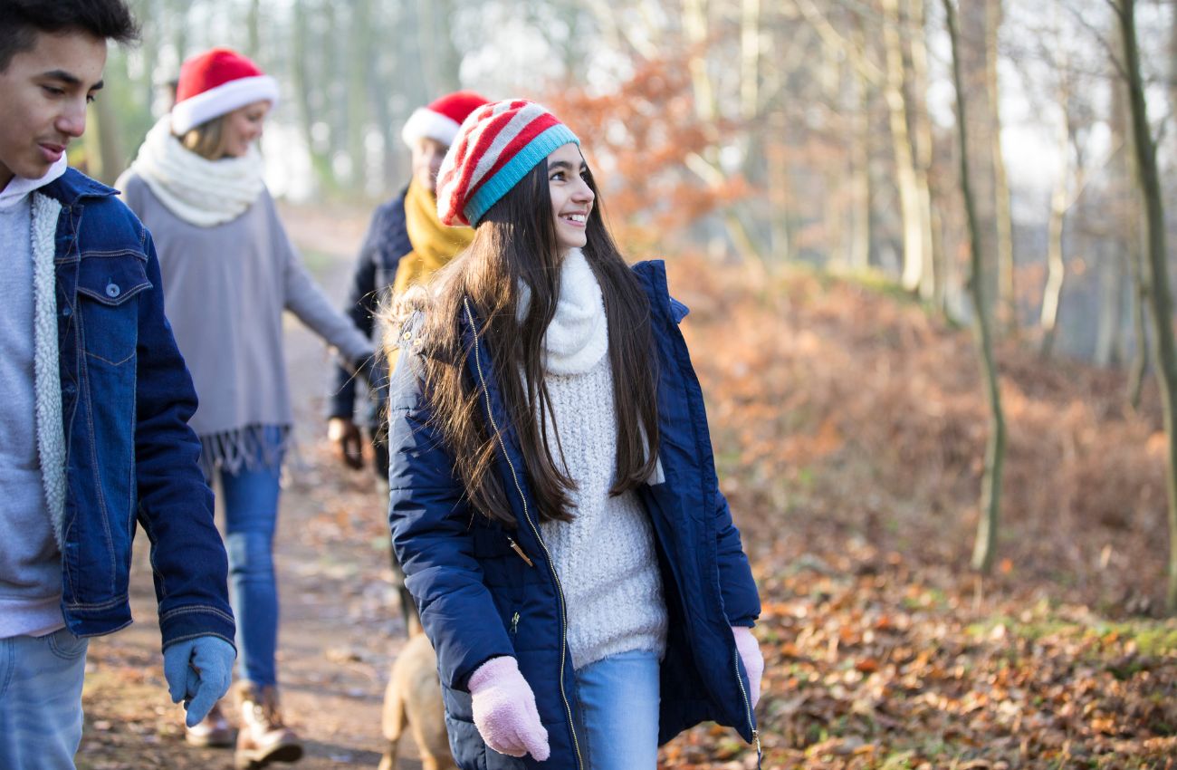 Manage your mental health during holiday gatherings by taking a walk.