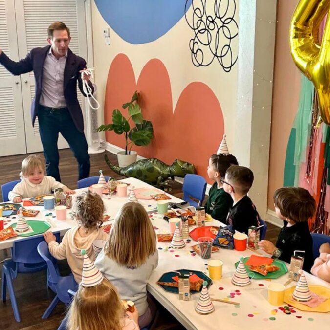 Mr. Christerious performs magic at a kids party in Philly.