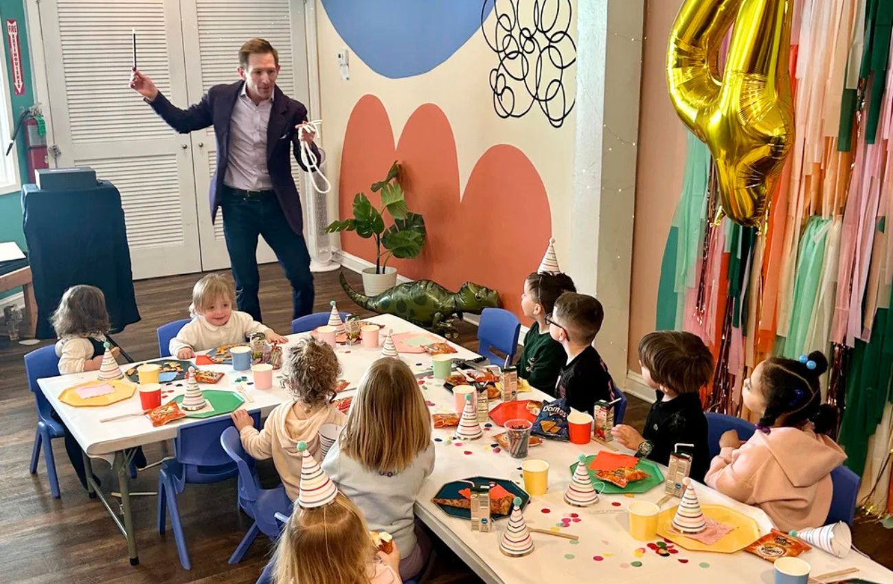 Mr. Christerious performs magic at a kids party in Philly.