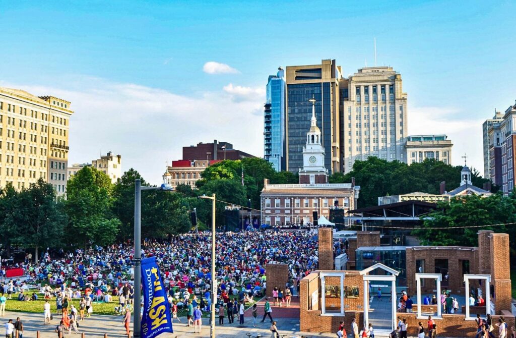 A crowd gathers on Independence Mall in Philadelphia during the summer. 