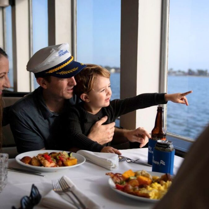 A family aboard a City Experiences Father's Day Cruise in Philadelphia.