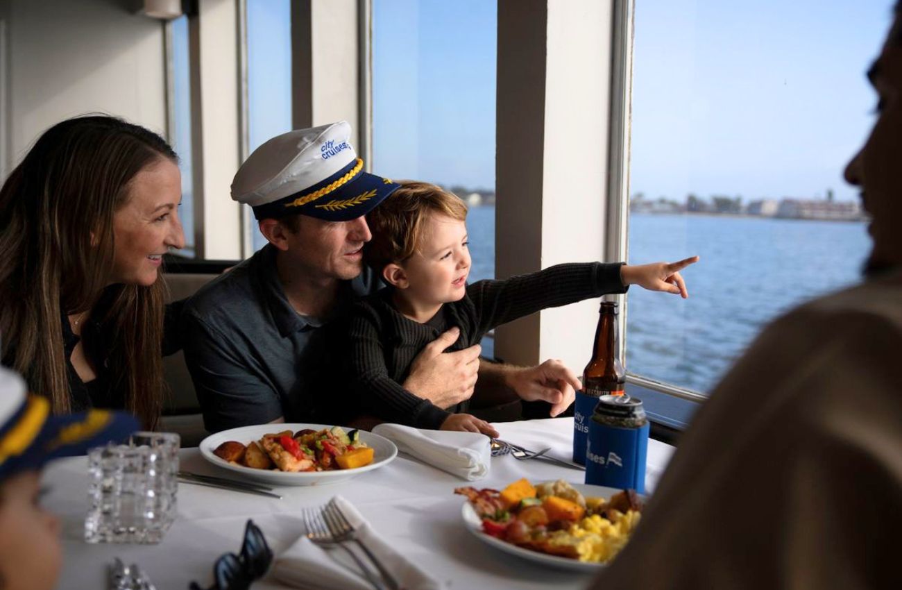 A family aboard a City Experiences Father's Day Cruise in Philadelphia.